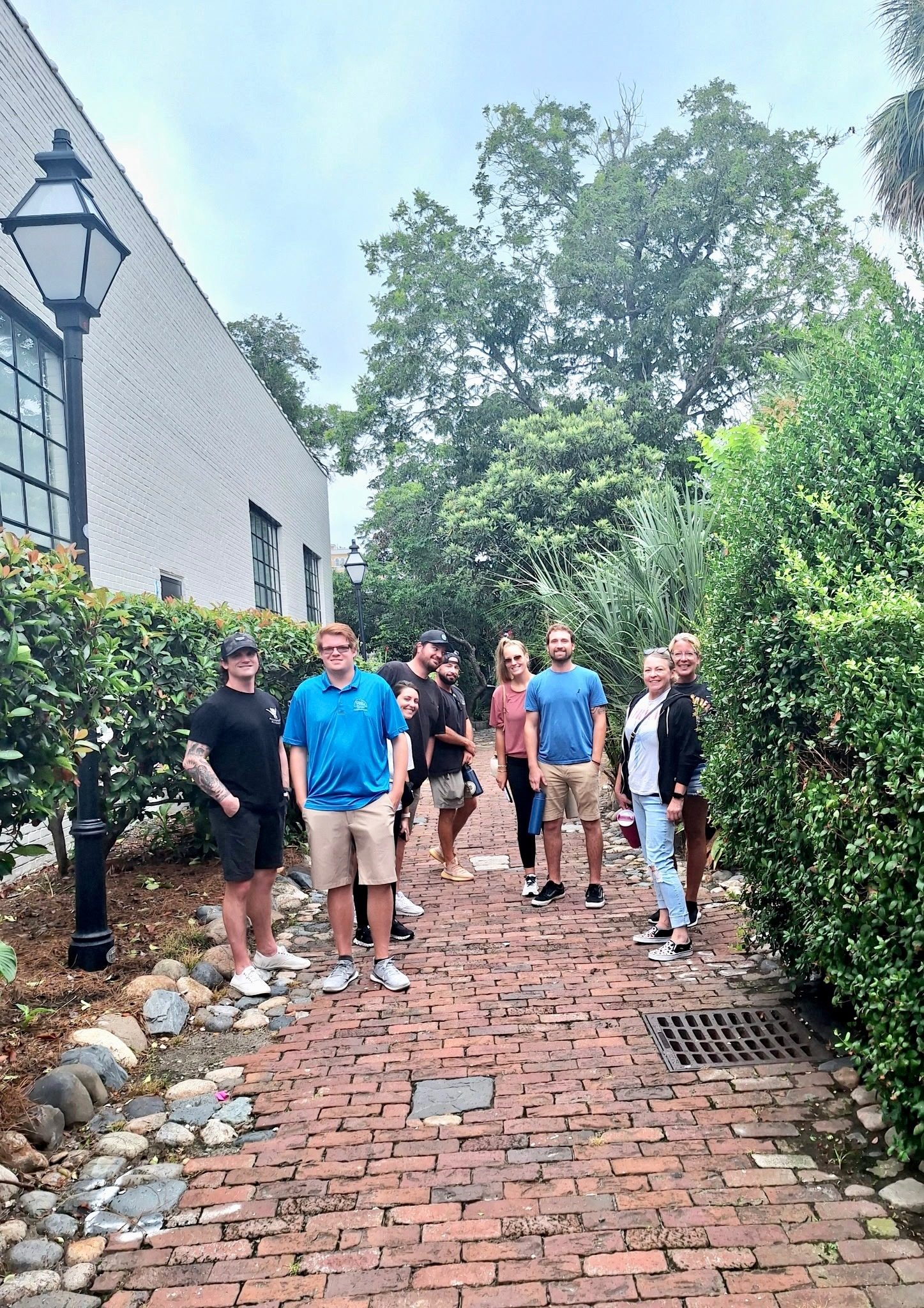 Group walking through downtown Charleston to a recovery meeting